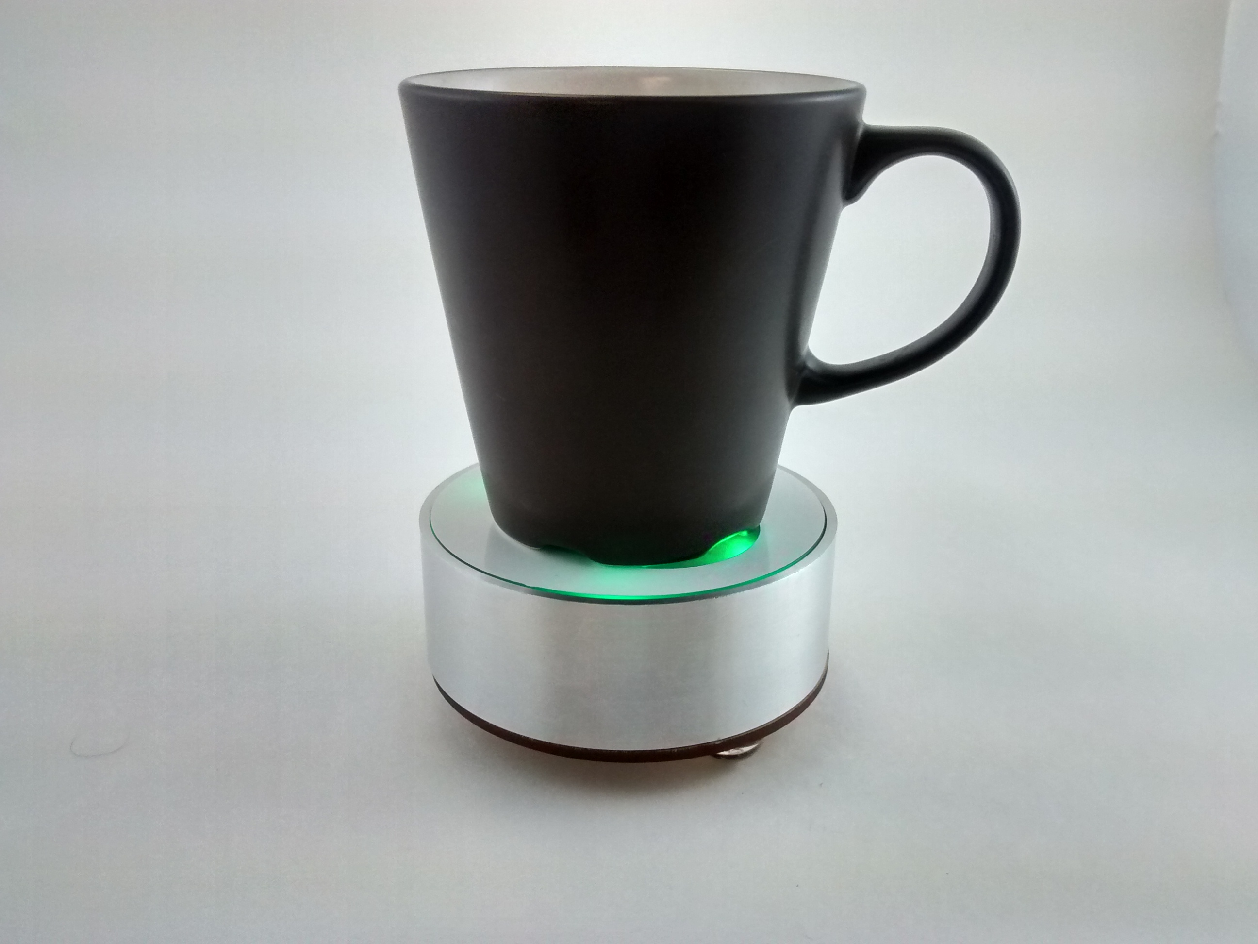 image of chatty coaster with mug on it.